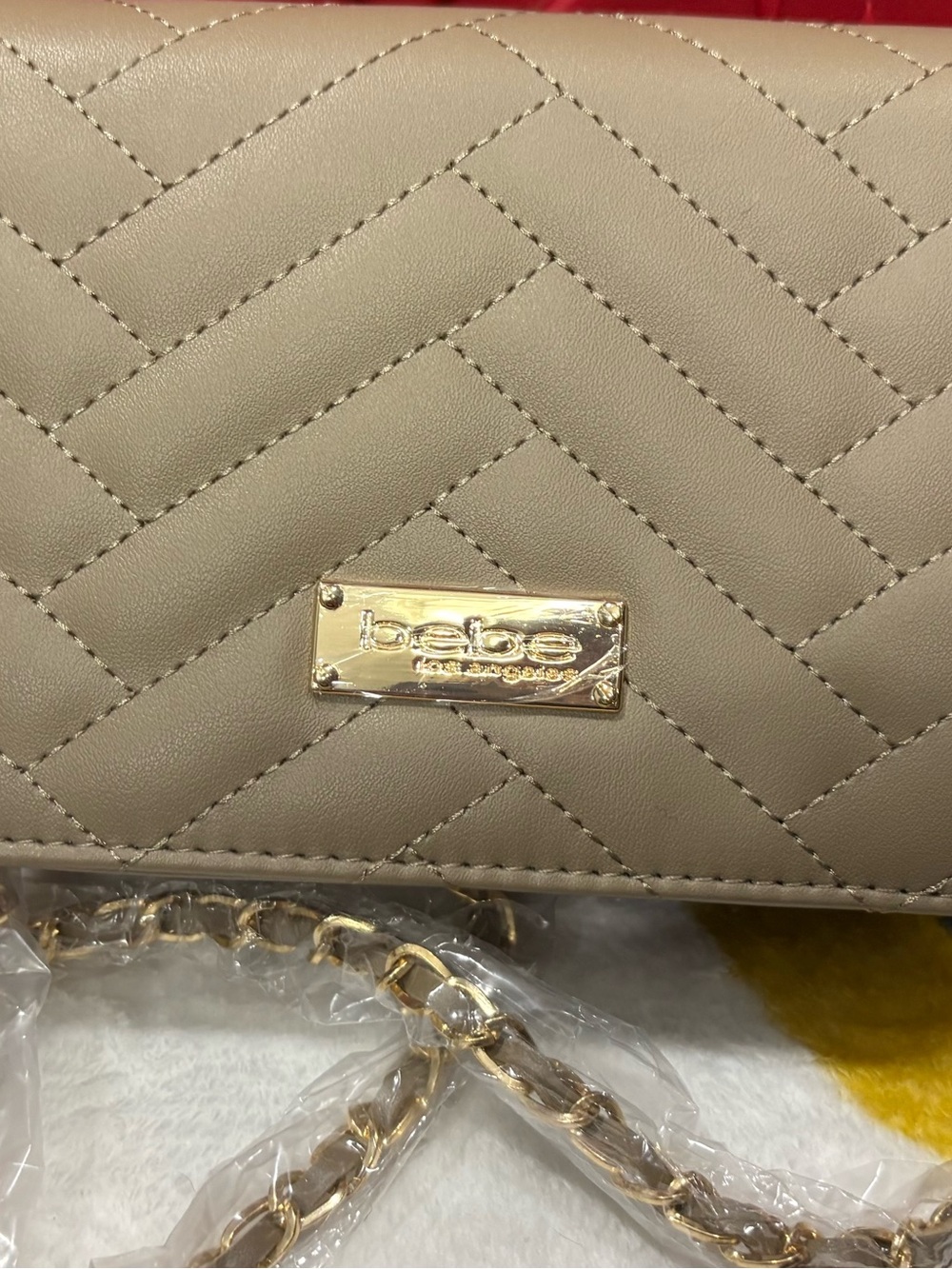 bebe Quilted Taupe Crossbody with Gold Plaque